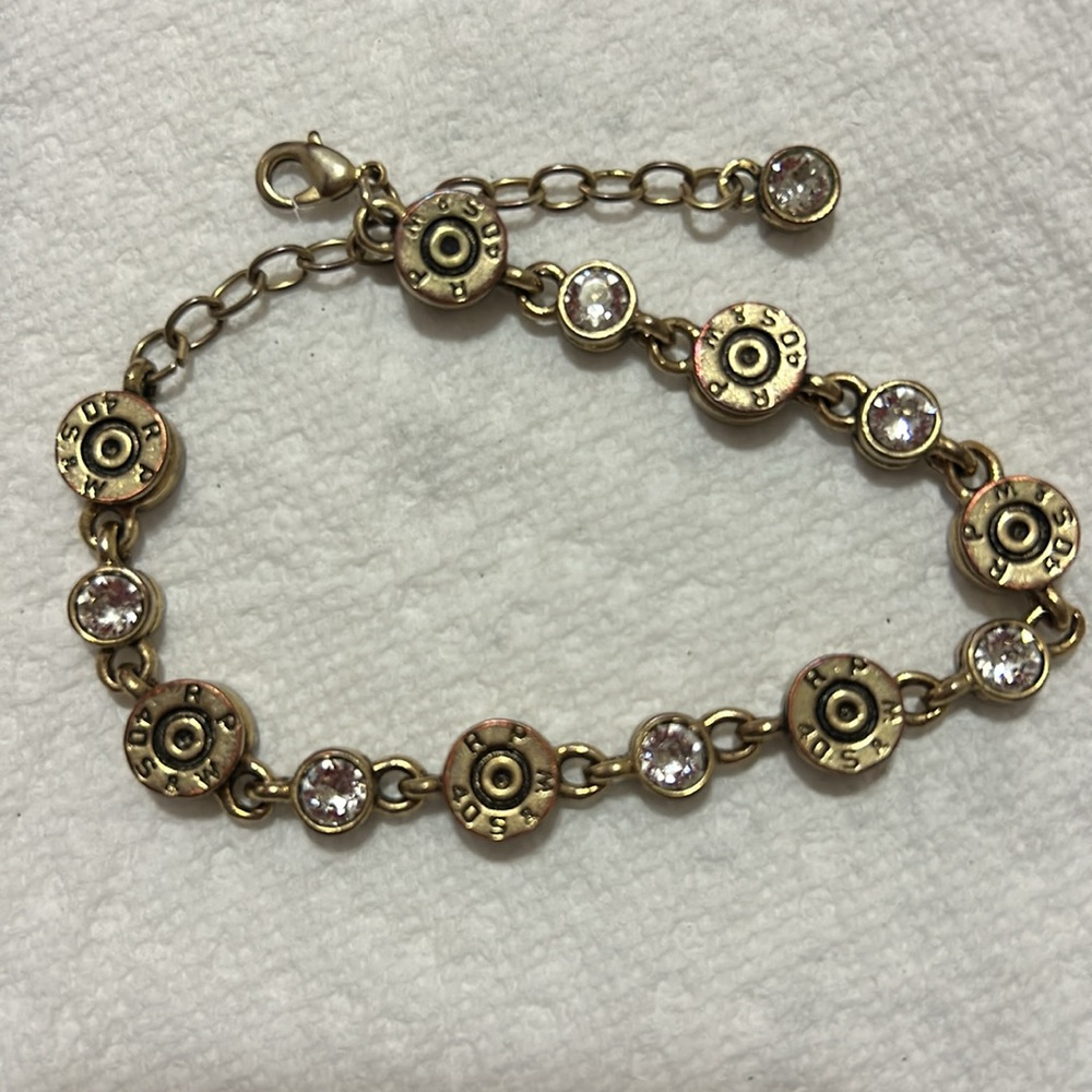 SureShot shotgun shell and crystal bracelet